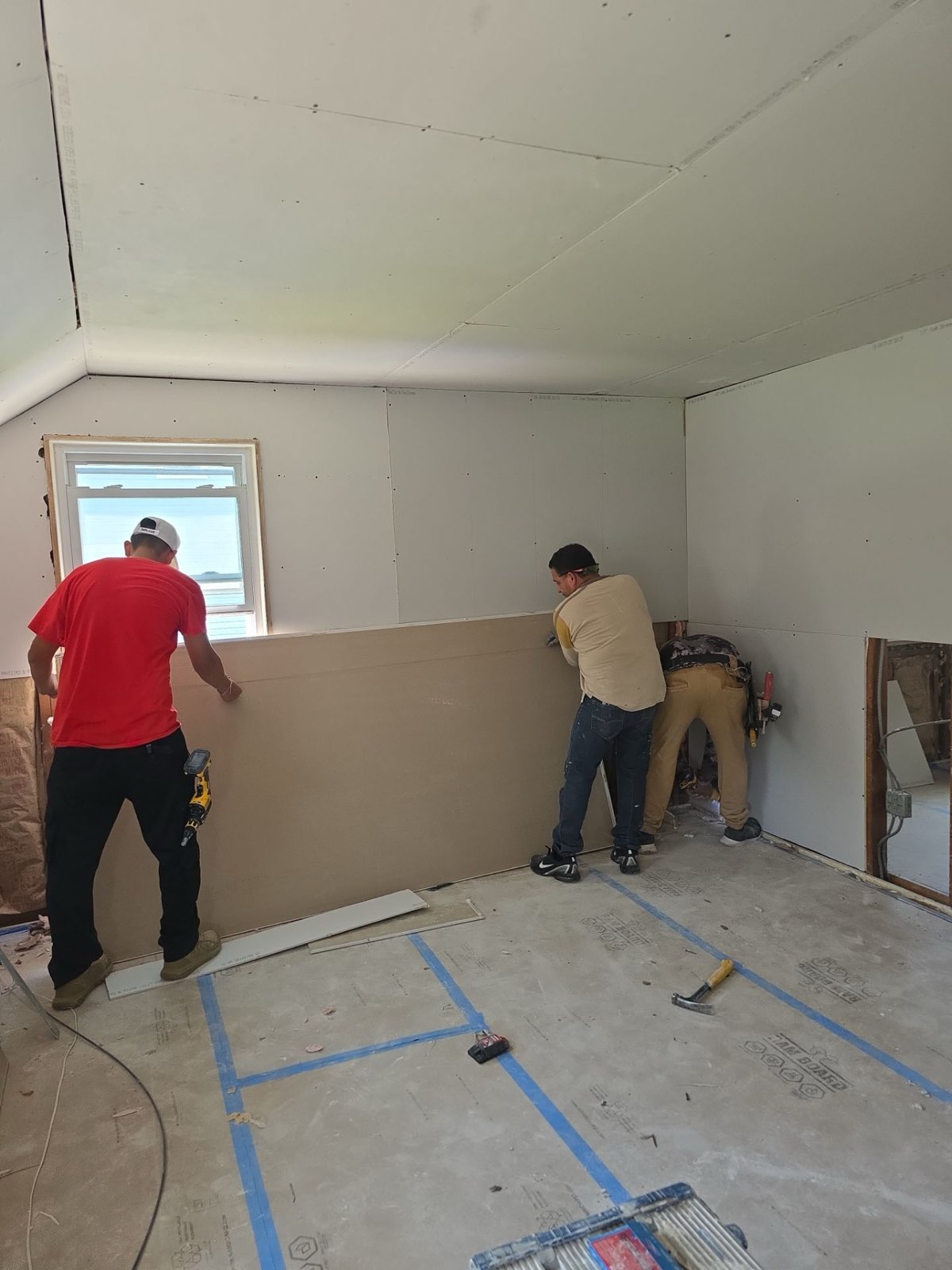 Rebuilding the interior — new walls where the water had been