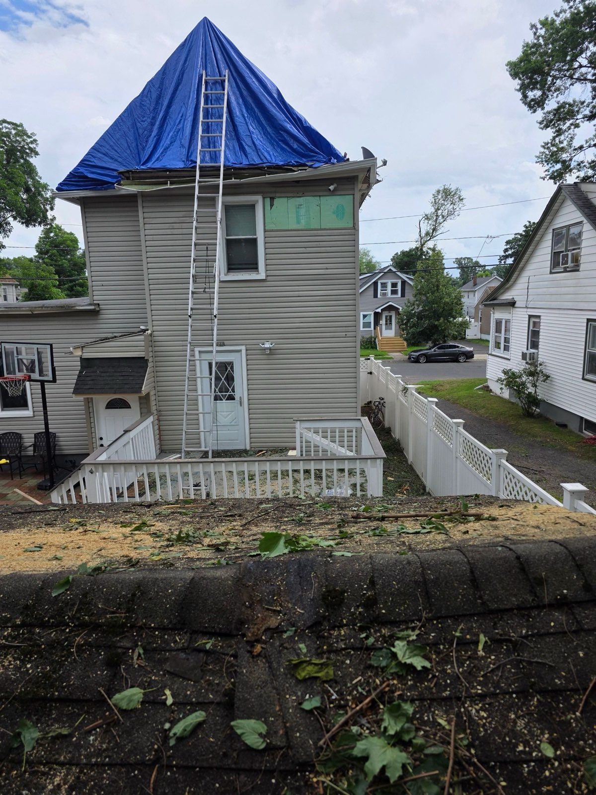Tree off, roof tarped, home protected