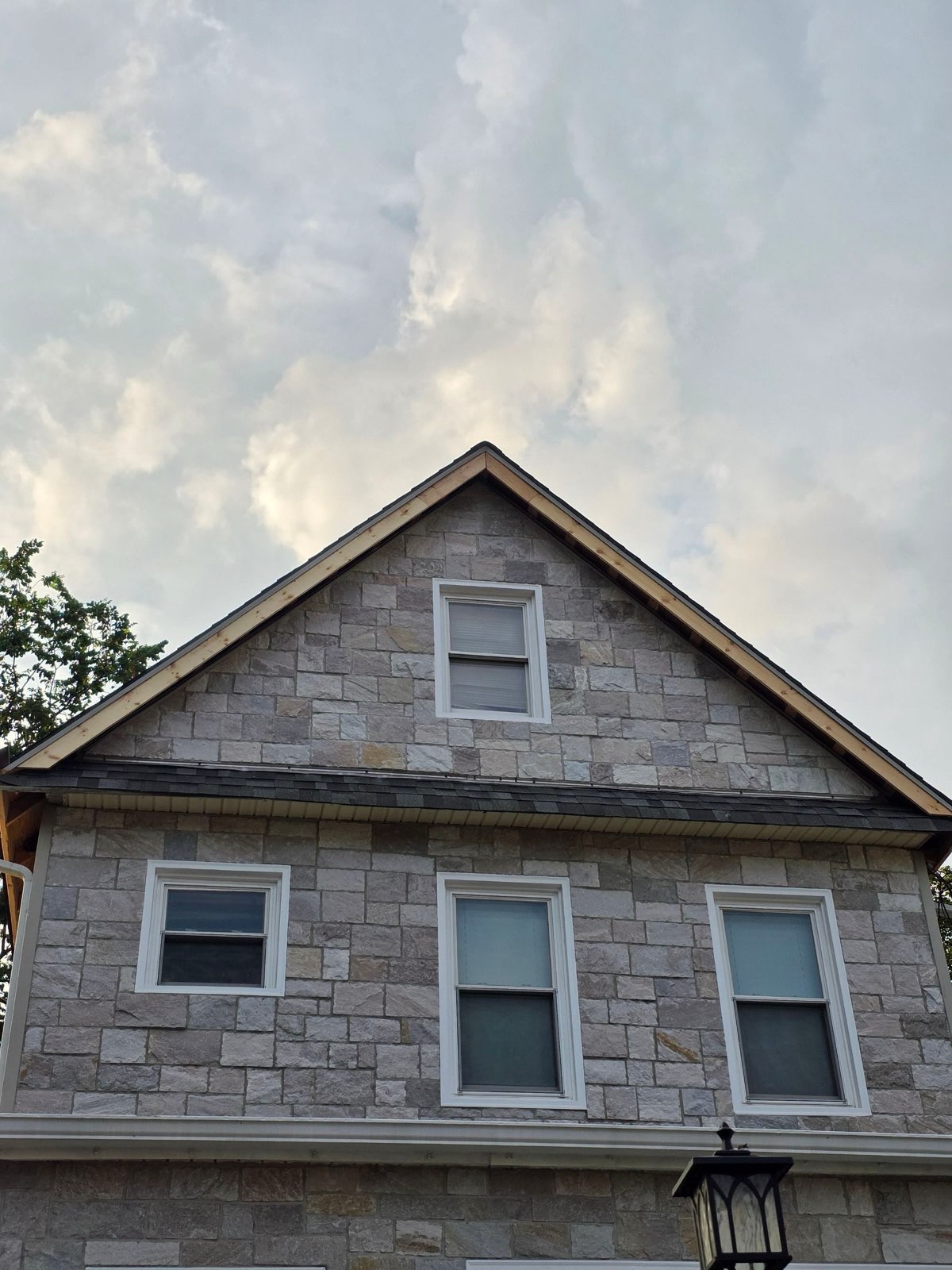 Complete — new roof and fresh fascia, house and garage